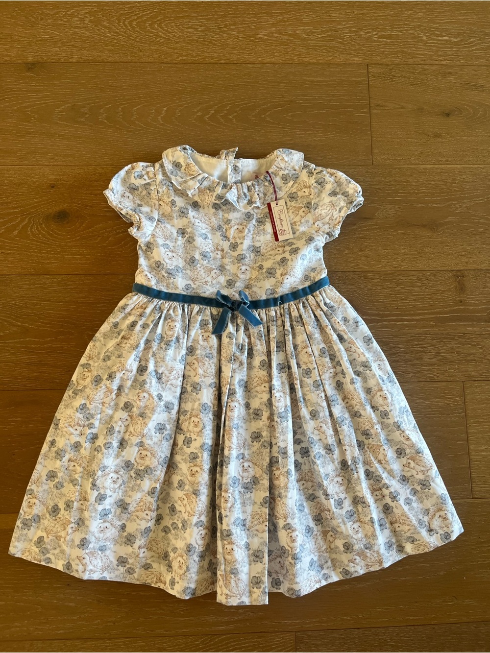 Trotters White and Blue Floral Dress with Blue Waist Ribbon